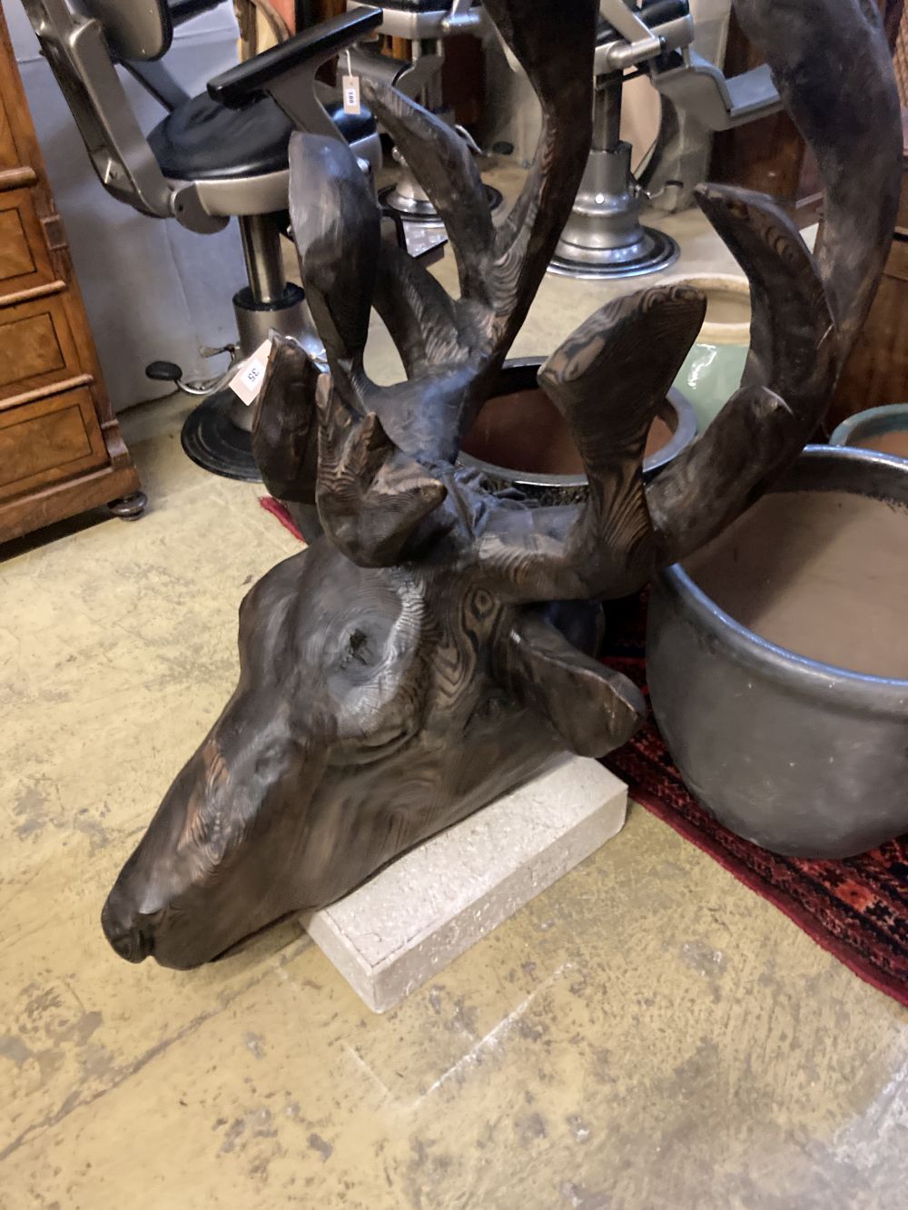 A large carved pine moose head sculpture, height 132cm